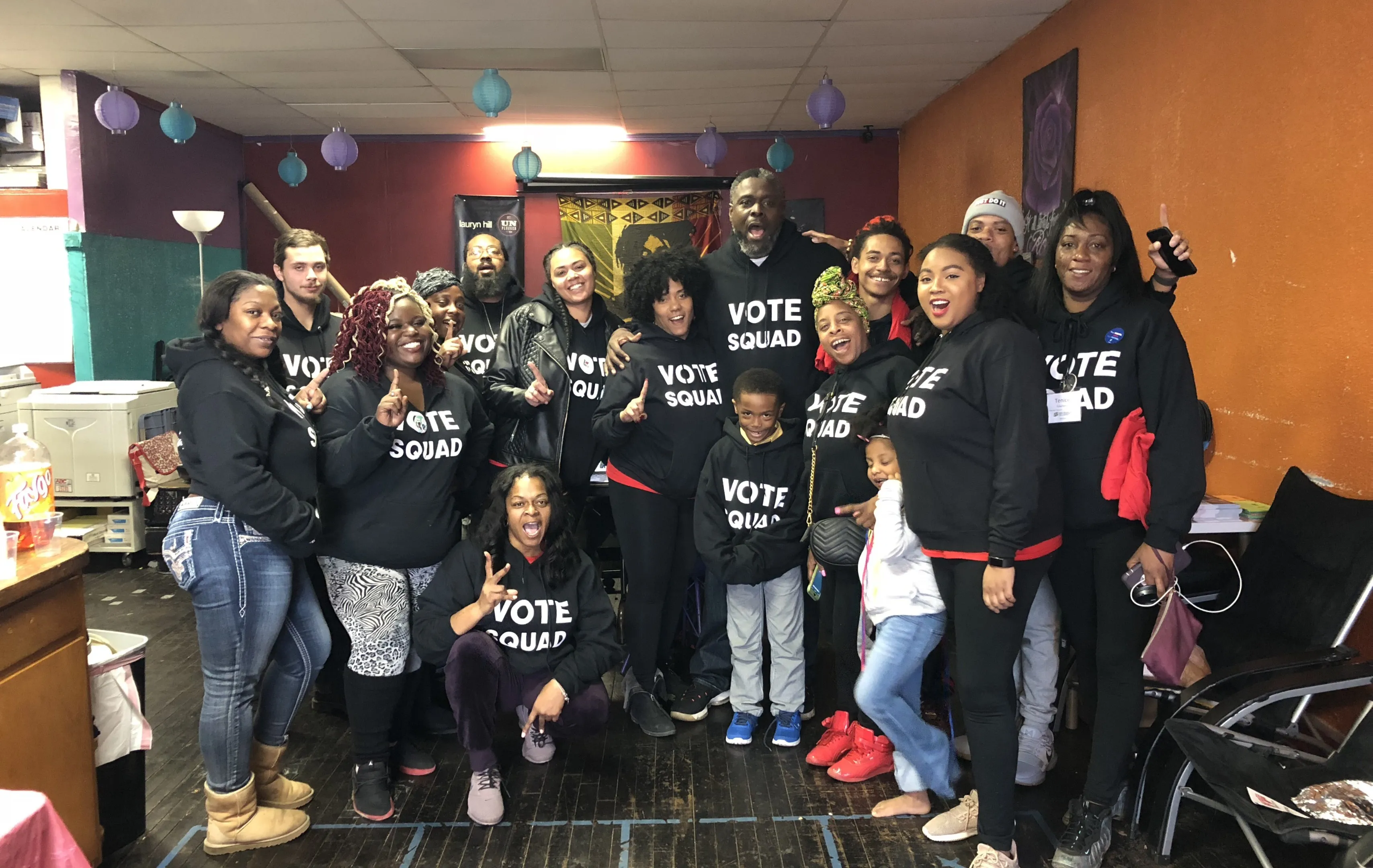 A group of BlackPAC volunteers in Vote Squad hoodies