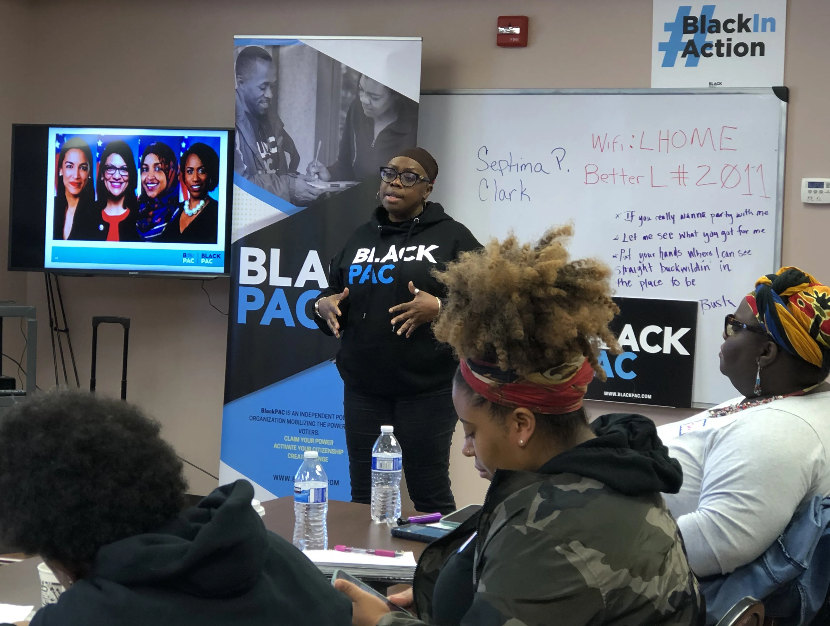 A BlackPAC organizer leading a training session